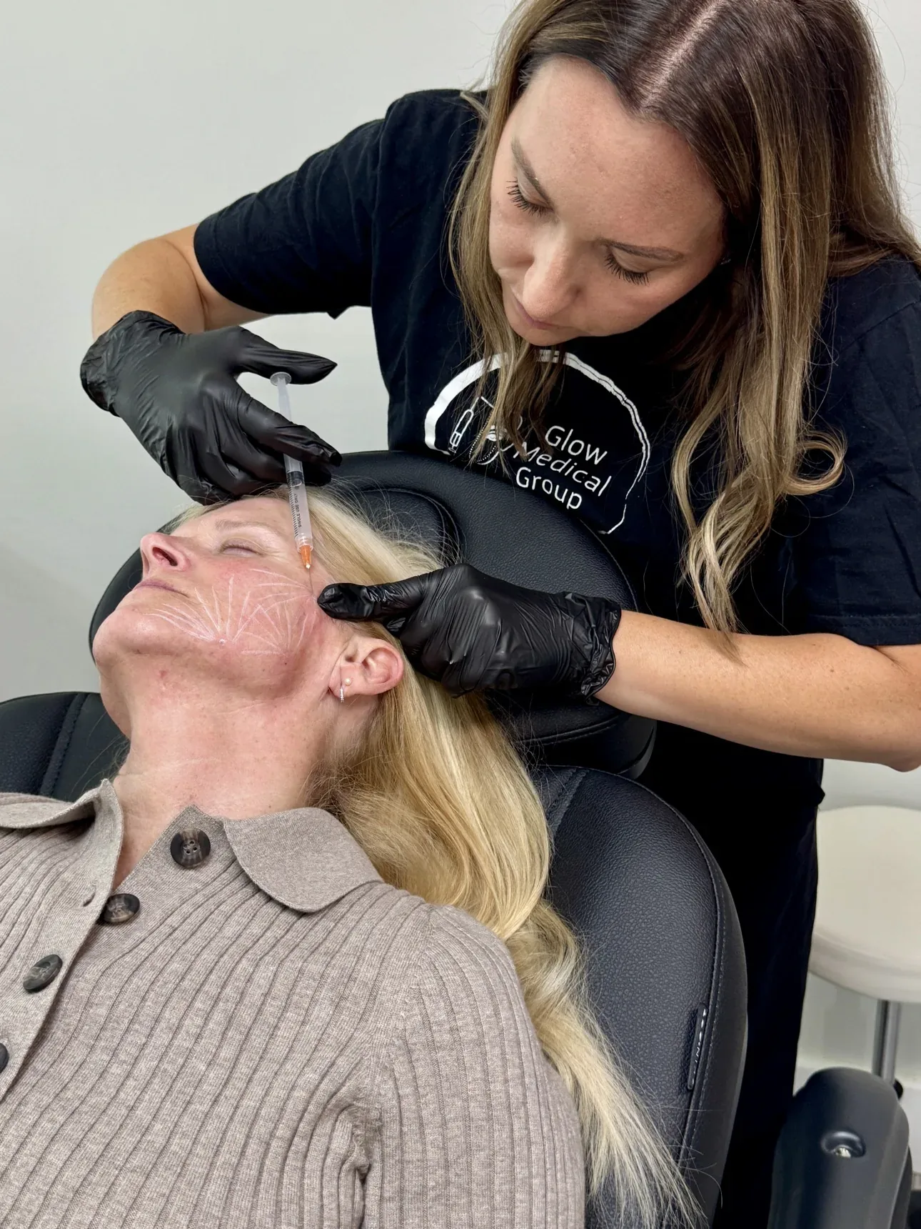 Sarah Jones, FNP-BC, mapping precise biostimulator placement at Glow Medical Group
