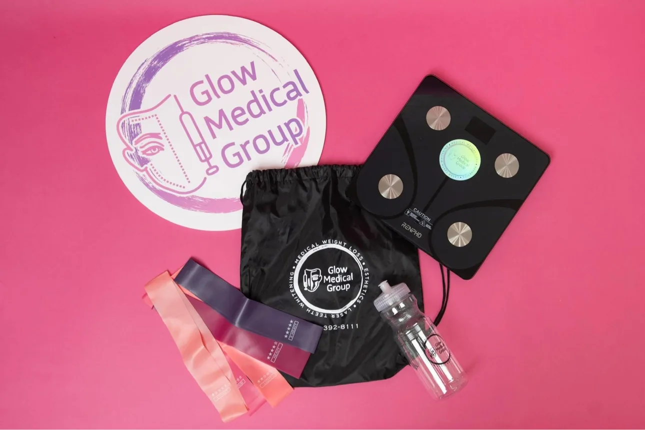 Glow Medical Group weight loss starter kit with resistance bands, scale, and water bottle
